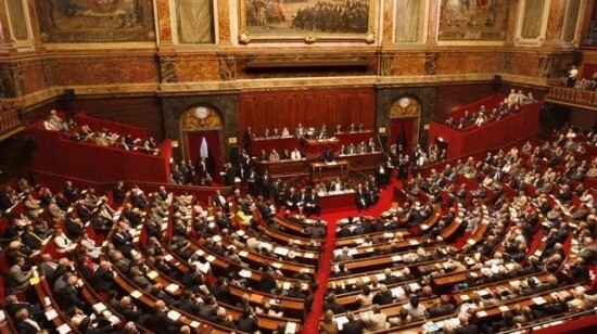 French MPs caught playing poker at work